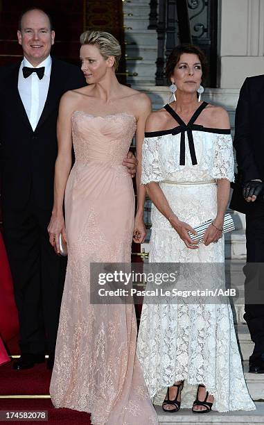 Prince Albert II of Monaco, Princess Charlene of Monaco and Princess Caroline of Hanover arrive at 'Love Ball' hosted by Natalia Vodianova in support...