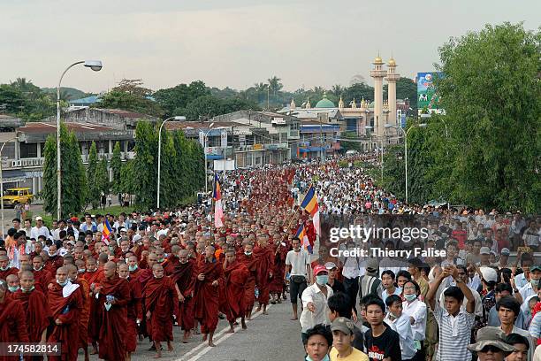 Tens of thousands of people led by Buddhist monks are demonstrating against the military junta in Rangoon streets. Tens of thousands of monks...
