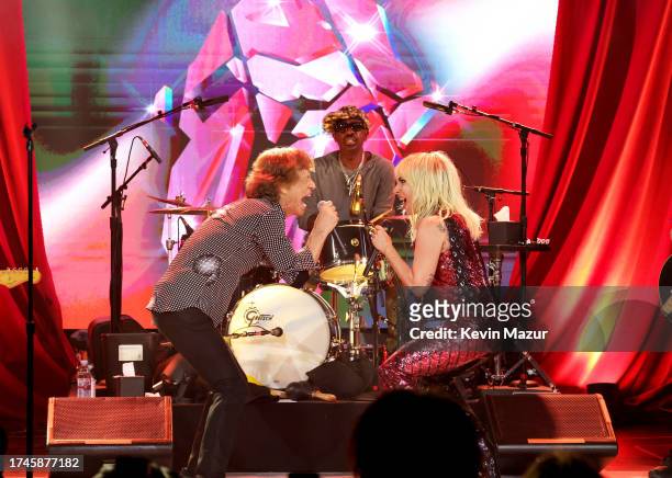 Mick Jagger and Lady Gaga perform during The Rolling Stones surprise set in celebration of their new album “Hackney Diamonds” at Racket NYC on...