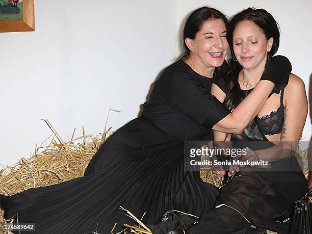 Marina Abramovic and Lady Gaga attend The 20th Annual Watermill Center Summer Benefit at The Watermill Center on July 27, 2013 in Water Mill, New...