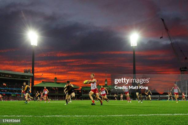 Ryan O'Keefe of the Swans clears the ball during the round 18 AFL match between the Sydney Swans and the Richmond Tigers at SCG on July 28, 2013 in...