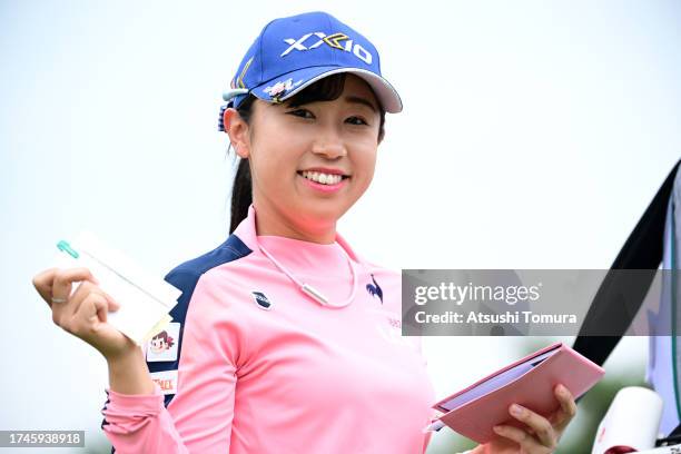 Nana Suganuma of Japan smiles after holing out on the 9th green during the second round of NOBUTA Group Masters GC Ladies at Masters Golf Club on...