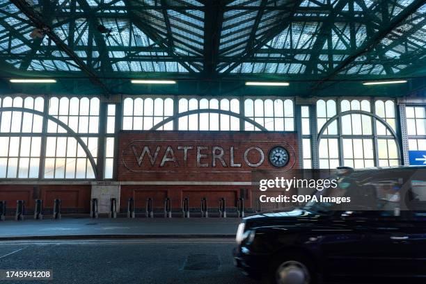 Sign for London Waterloo Station, a busy commuter station, part of the National Rail network in the United Kingdom.