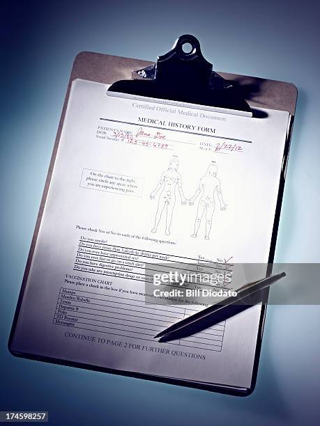 medical clipboard with pen - medical document stock pictures, royalty-free photos & images
