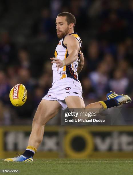 Ashton Hams of the Eagles kicks the ball during the round 18 AFL match between the Western Bulldogs and the West Coast Eagles at Etihad Stadium on...