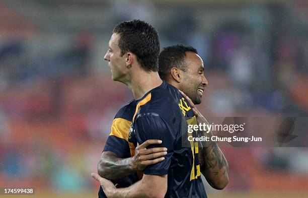 Mitchell Duke of Australia celebrates after scoring a goal during the EAFF East Asian Cup match between Australia and China at Jamsil Stadium on July...