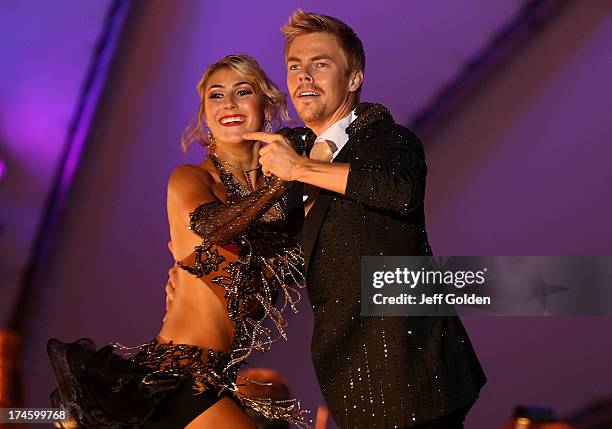 Derek Hough dances with partner Emma Slater to Glenn Miller's "In The Mood" during the California Philharmonic Festival on the Green at Santa Anita...