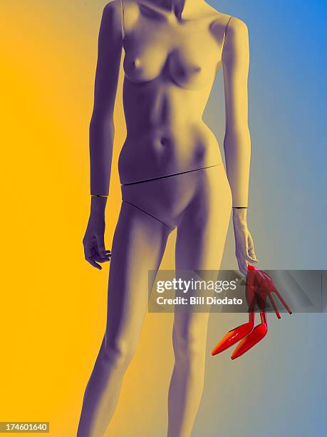 mannequin with shoes in hand - semi dress stock pictures, royalty-free photos & images