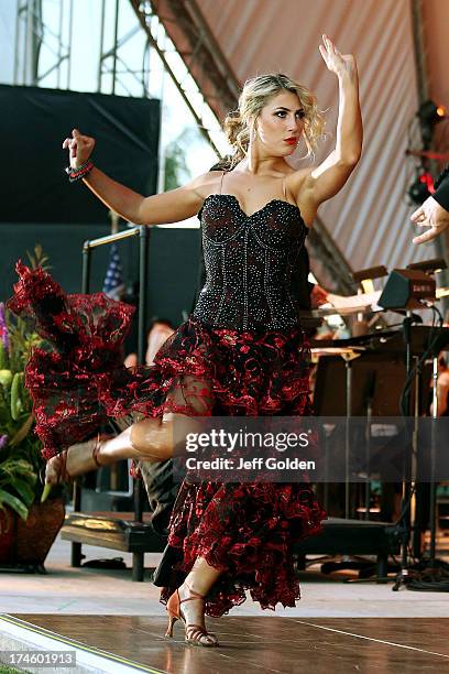 Emma Slater dances during the California Philharmonic Festival on the Green at Santa Anita Race Track on July 27, 2013 in Arcadia, California.