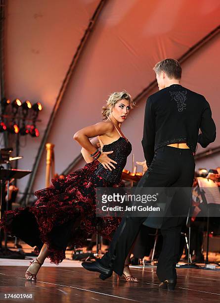 Emma Slater dances with partner Derek Hough during the California Philharmonic Festival on the Green at Santa Anita Race Track on July 27, 2013 in...