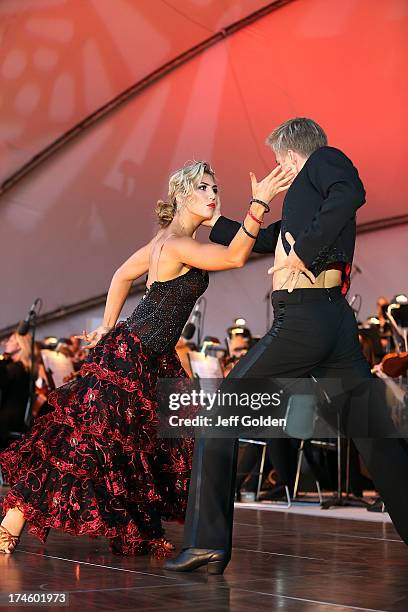 Emma Slater dances with partner Derek Hough during the California Philharmonic Festival on the Green at Santa Anita Race Track on July 27, 2013 in...