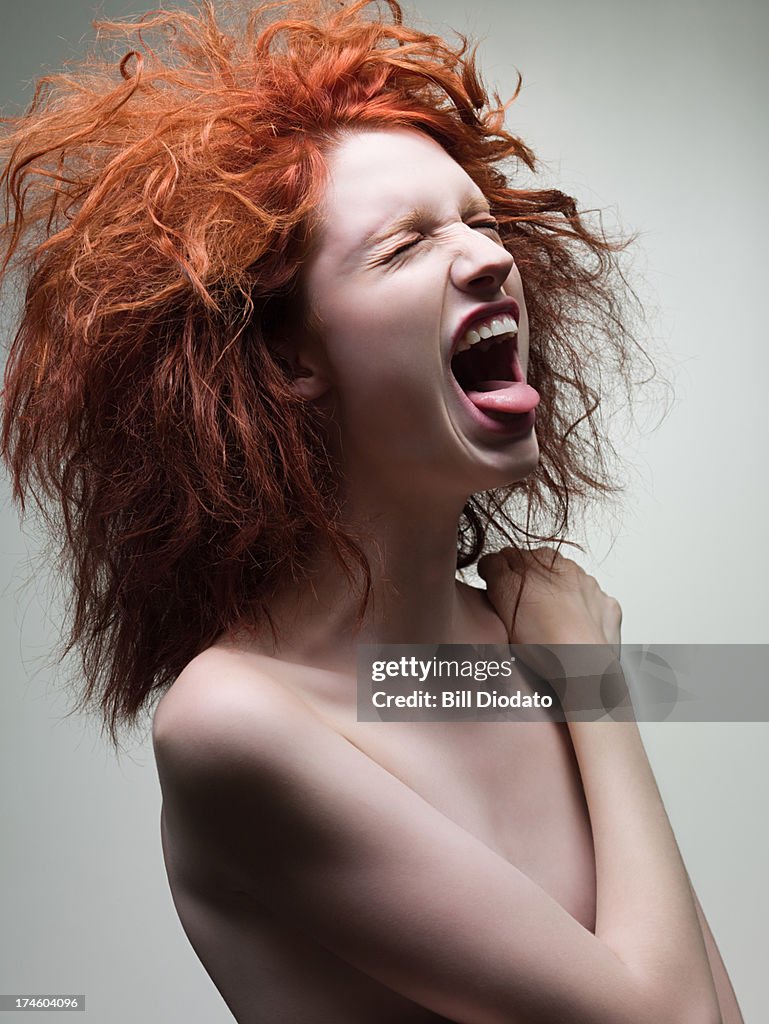 Young woman screaming