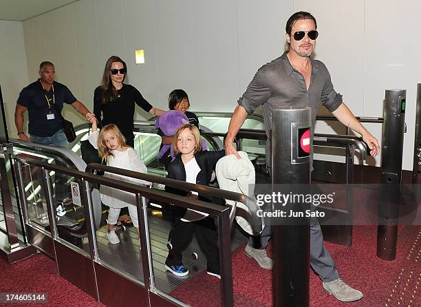 Brad Pitt, Angelina Jolie and their children Pax, Knox and Vivienne arrive at Tokyo International Airport on July 28, 2013 in Tokyo, Japan.