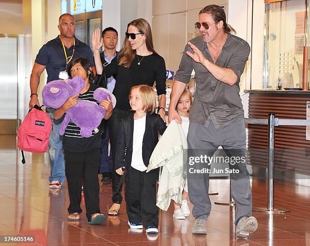 Brad Pitt, Angelina Jolie and their children Pax, Knox and Vivienne arrive at Tokyo International Airport on July 28, 2013 in Tokyo, Japan.