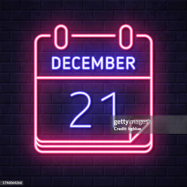 december 21. glowing neon icon on brick wall background - december 21 stock illustrations