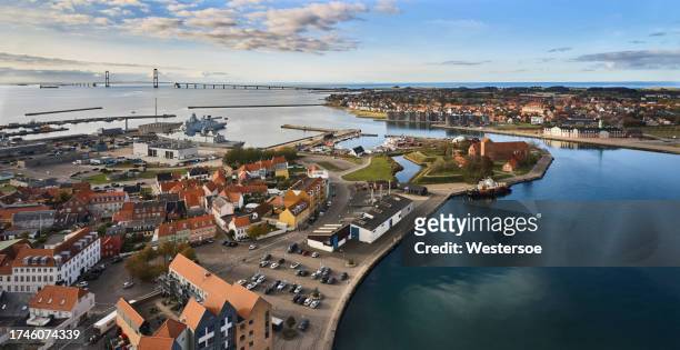 aerial view of harbor in small danish town korsoer and the great belt bridge - zealand denmark stock pictures, royalty-free photos & images