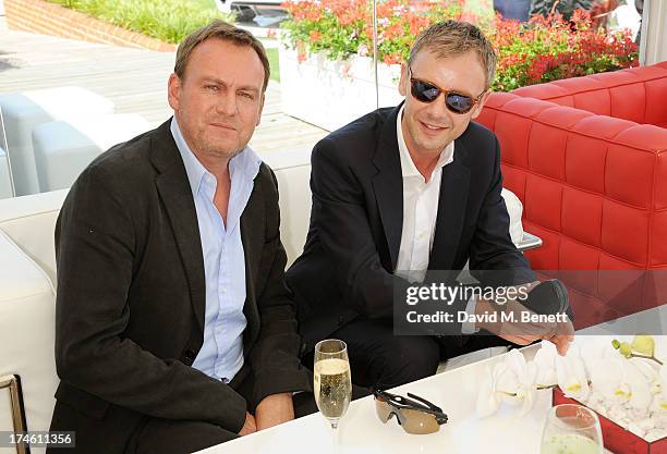 Philip Glenister and John Simm attend the Audi International Polo at Guards Polo Club on July 28, 2013 in Egham, England.