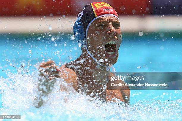 Albert Espanol of Spain celebrates during the Men's Water Polo quarterfinals qualification match between United States of America and Spain during...