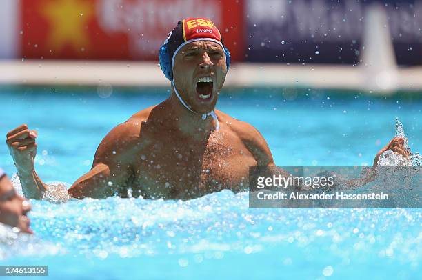 Albert Espanol of Spain celebrates during the Men's Water Polo quarterfinals qualification match between United States of America and Spain during...