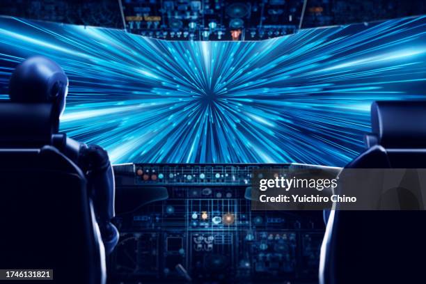 robot inside spaceship and hyperspace jump - flight-instruments stockfoto's en -beelden