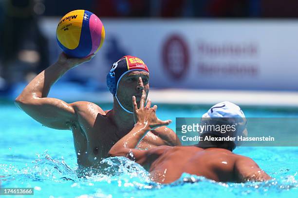 Albert Espanol of Spain in action with Janson Wigo of US during the Men's Water Polo quarterfinals qualification match between United States of...
