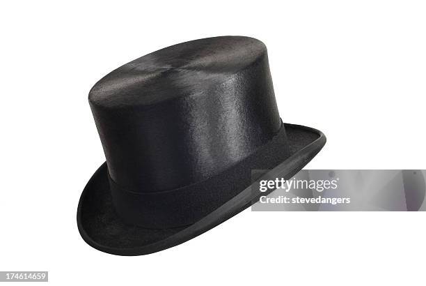 a black top hat on a white background - top hat stock pictures, royalty-free photos & images