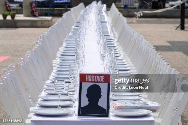 Shabbat Dinner" table is prepared at the Tel Aviv museum plaza, with 200 empty seats, representing the hostages and missing people on October 20,...