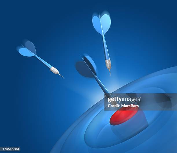 blue darts on target - dart stock pictures, royalty-free photos & images