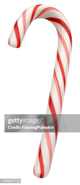 red and white candy cane turned in profile - candy cane stock pictures, royalty-free photos & images