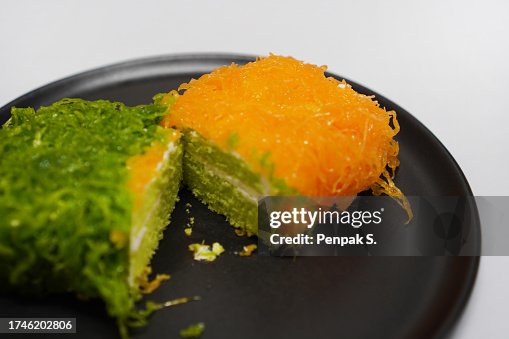 Thread Cake Gold Egg Yolk Thread Cakes Fios De Ovos In Black Plate High-Res Stock ...