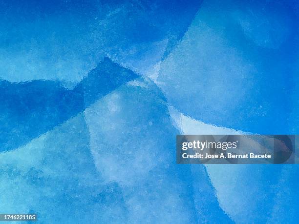 textures and cracks of a surface of bluish ice crystals. - scratched ice stock pictures, royalty-free photos & images