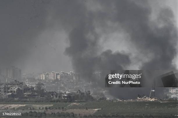 Smoke rises from buildings demolished by Israeli Air Force airstrikes and artilery are seen in Beit Lahiya on the Northern Gaza Strip on October 26,...