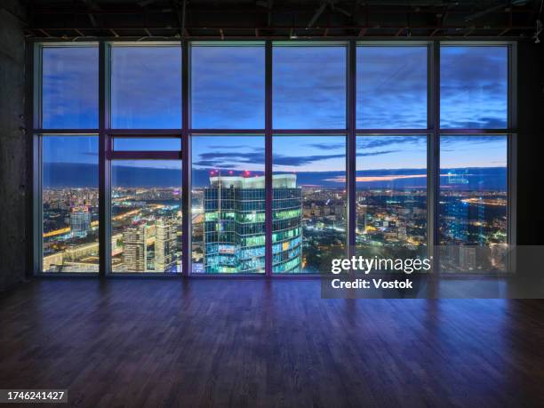 panoramic view of modern moscow from the apartment window - big living room stock pictures, royalty-free photos & images