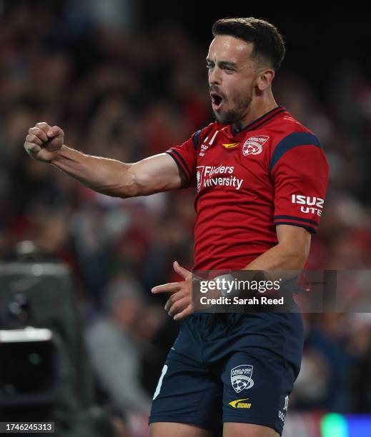 Zach Clough of Adelaide United Celebrates a goal during the A-League Men round 1 match between Adelaide United and Central Coast Mariners at Coopers...