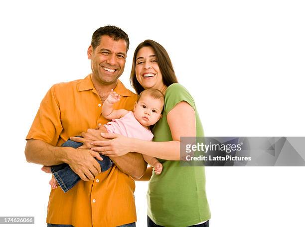 smiling hispanic couple holding infant girl - family white background stock pictures, royalty-free photos & images