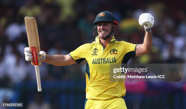 Mitch Marsh of Australia celebrates their century during the ICC Men's Cricket World Cup India 2023 between Australia and Pakistan at M. Chinnaswamy...
