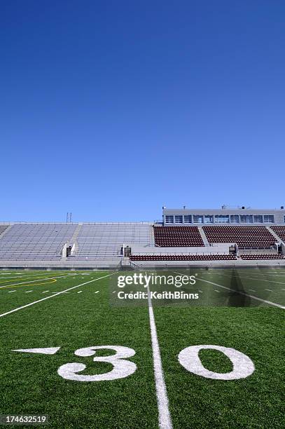 a close-up of the 30 yard line on a football field - artificial turf stock pictures, royalty-free photos & images