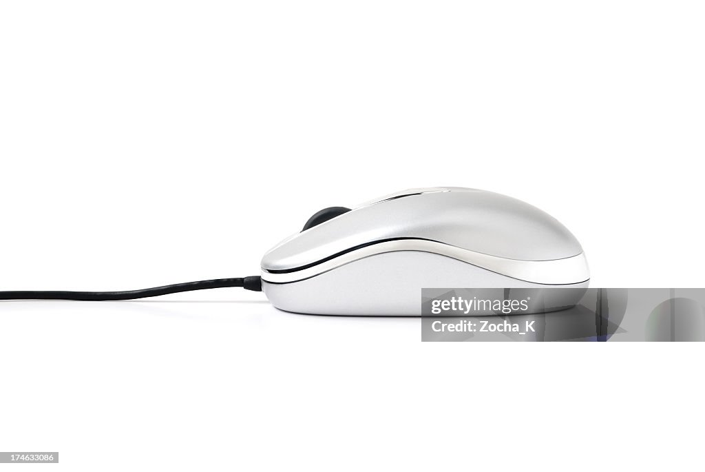 A silver computer mouse on a white background