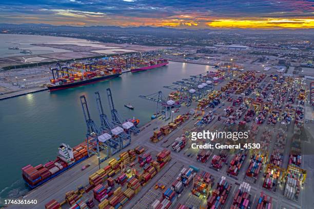 aerial view container ships at dock. - rotterdam stock-fotos und bilder