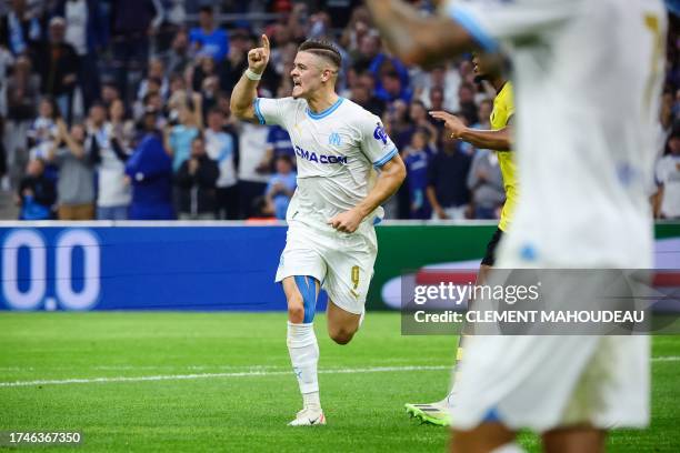 Marseille's Portuguese forward Vitinha celebrates after opening the scoring during the UEFA Europa League Group B football match between Olympique...