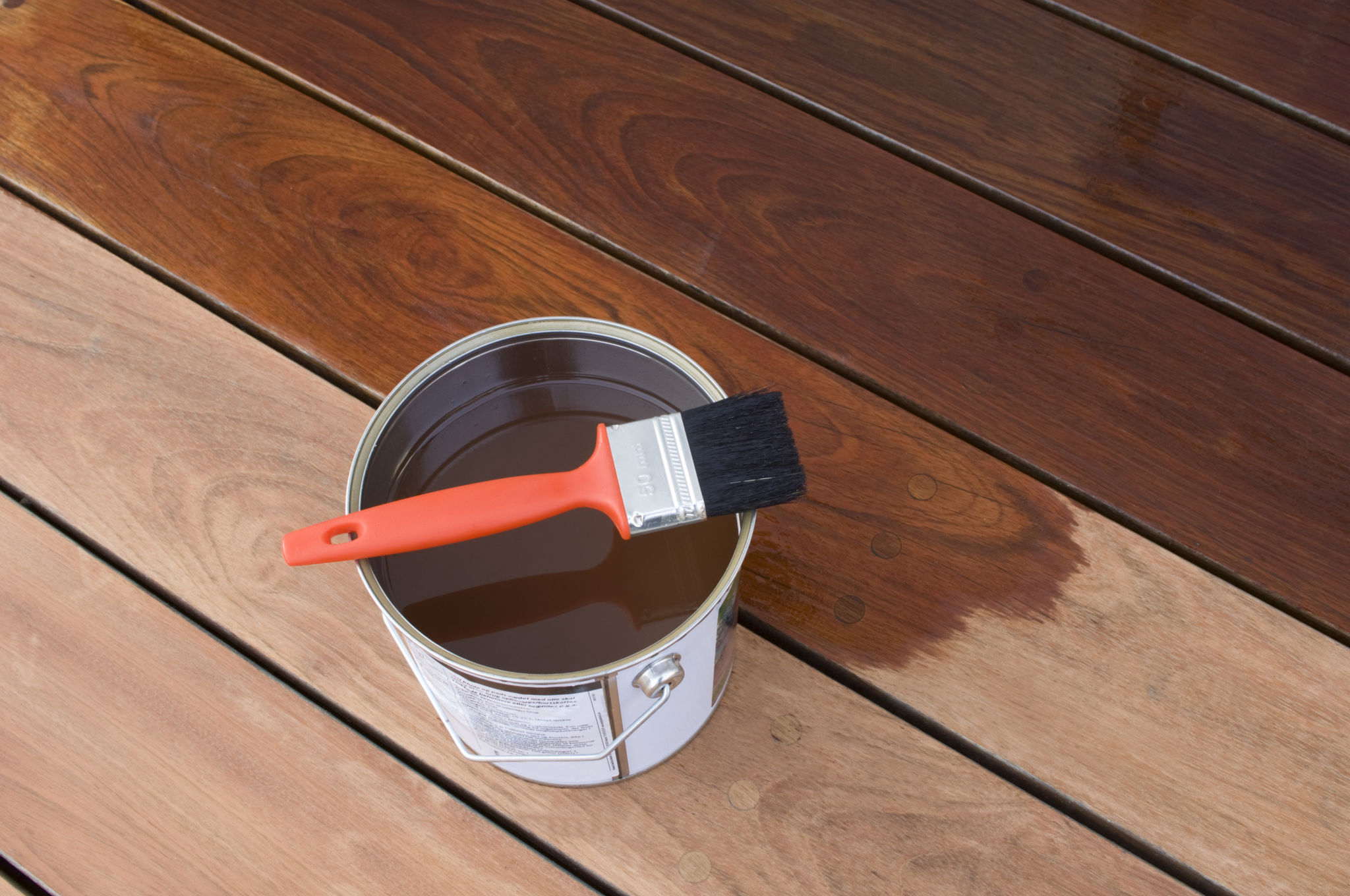applying deck stain