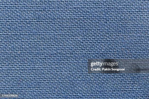 blue sackcloth texture and textile background with full frame. - borduurwerk stockfoto's en -beelden