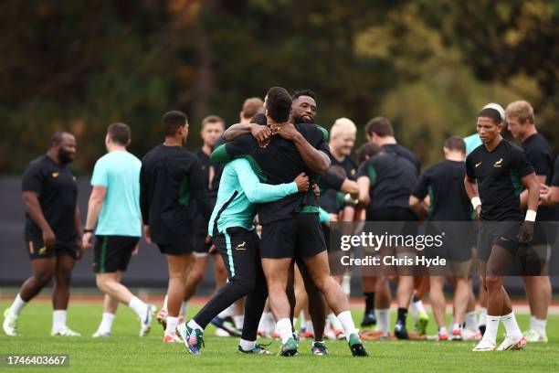 Siya Kolisi of South Africa with team mates during the Captain's Run ahead of their Rugby World Cup France 2023 match against England at Stade de...