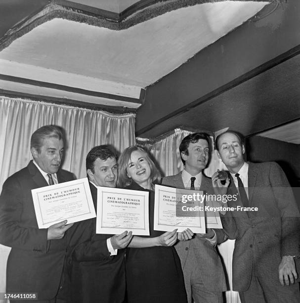 Pierre Mondy, Maria Machado et Claude Rich recevant les Prix de l'Humour Cinématographique, le 19 décembre 1966.