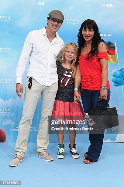 Gedeon Burkhard, Gioia Filomena and Gisella Marengo attend the 'Die Schluempfe 2' Germany Premiere at Sony Centre on July 28, 2013 in Berlin, Germany.
