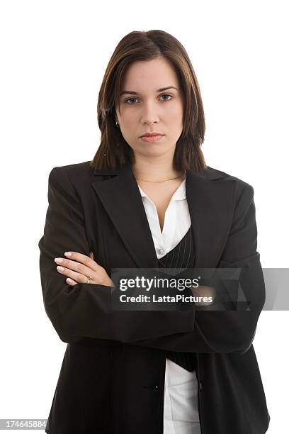 serious young female wearing jacket arms crossed - isolated women serieus sad stockfoto's en -beelden