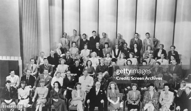 Metro Goldwyn Mayer Studios boss Louis B Mayer and his roster of stars including Gene Kelly, Hedy Lamarr, Lucille Ball, James Stewart, Mickey Rooney,...