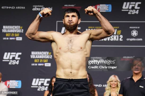 Magomed Ankalaev of Russia poses on the scale during the UFC 294 ceremonial weigh-in at Etihad Arena on October 20, 2023 in Abu Dhabi, United Arab...