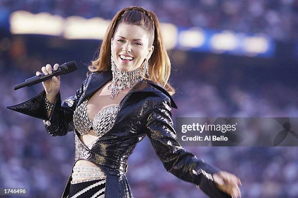 Singer Shania Twain performs during halftime of Super Bowl XXXVII between the Tampa Bay Buccaneers and the Oakland Raiders on January 26, 2003 at...