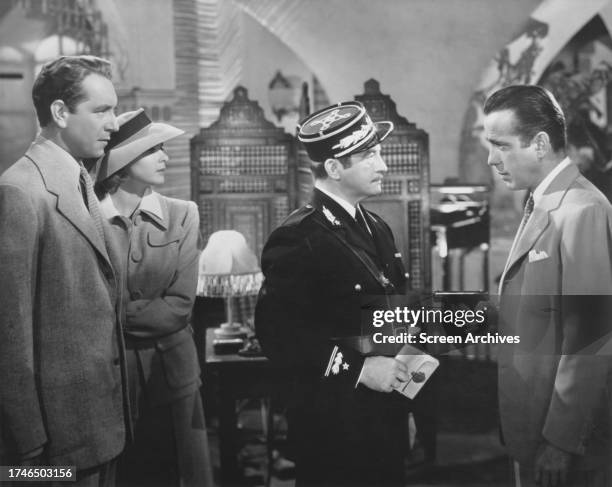 Ingrid Bergman, Humphrey Bogart, Paul Henreid and Claude Rains in a scene from the classic Michael Curtiz film 'Casablanca'.